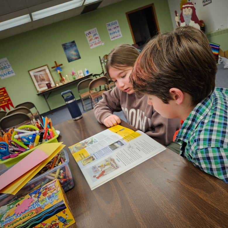 Boy and girl reading Sunday School workbook at Bethlehem Lutheran Church in West Dundee, IL